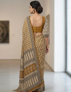 Mustard color Dabu Ajrak print Mul cotton saree